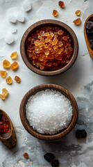 Wooden Bowls of White and Brown Sugar Crystals, Scattered on Marble