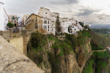 ronda,malaga,spain 11-27-2024 view of the houses of the village of ronda on the cliff edge