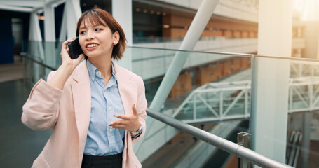 Japanese, business and woman talking with phone call for civil engineering, infrastructure and schedule. Person, mobile and communication for inspection, safety control and building progress in Japan