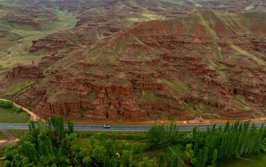 Red fairy chimneys shaped like formations that are millions of years old, Erzurum, Land of Red...