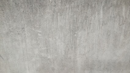 Grungy, textured concrete wall. Perfect for industrial backgrounds.
