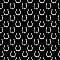 Horseshoe icon isolated seamless pattern on black background