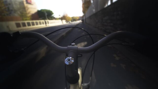 Person Entraina chooses an eco-responsible transport such as the city bike to get to work, to go for walks in the streets of the city of Montpellier located in France. High quality 4k footage