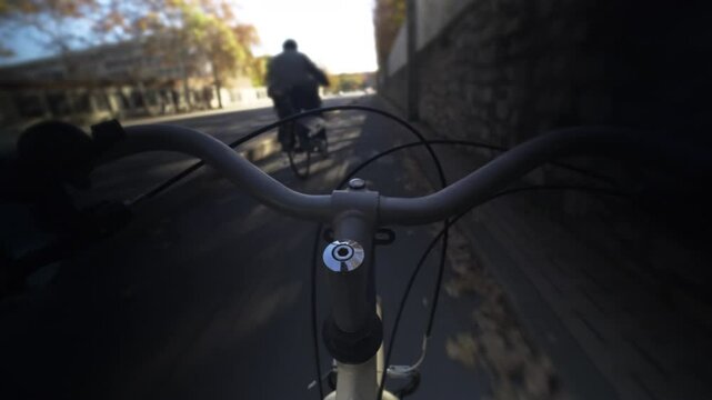 Person Entraina chooses an eco-responsible transport such as the city bike to get to work, to go for walks in the streets of the city of Montpellier located in France. High quality 4k footage