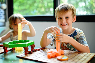 Sibling with board game