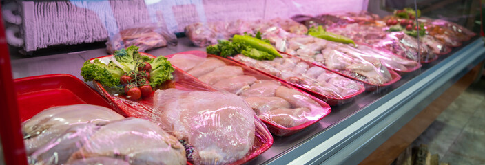 Meats in the supermarket freezer, frozen meats