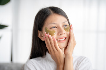 Daily beauty routine Asian woman  self care and relax with silicone under eye patches  smiling happy using skincare product