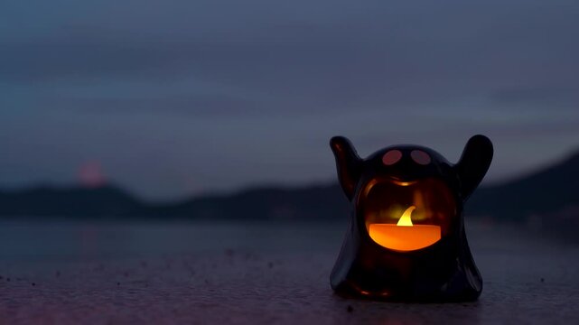 Concept: Halloween beach and ocean background with sea ghost with witch ghost fire, dark, scary tone.