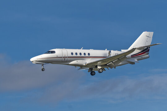 Geneva, Switzerland - november 27, 2024 : sign and logo on an airplane Dassault Falcon 8X of Jet view landing at Geneva Airport