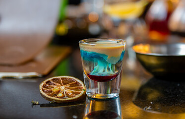 colorfull drink shot in a bar 