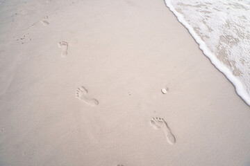 Footsteps in the sand | Footsteps on the beach | Walking on the beach | Step by step paradise | Footsteps showing progress and dedication