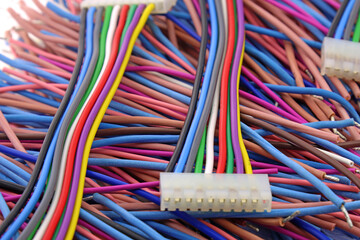 Copper electrical installation wires in colored insulation. Close-up. Soft focus.