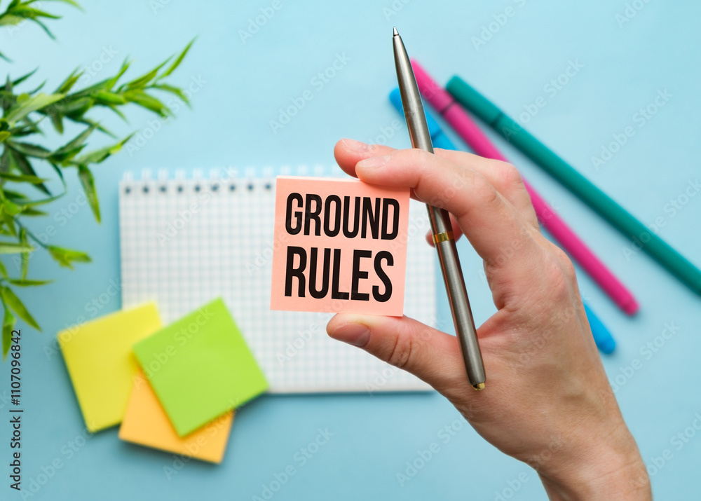 Poster on a light background - bright multicolored stickers with the text ground rules.