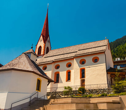 Church on a sunny summer day at Finkenberg, Zillertal valley, Schwaz, Zell am Ziller, Tyrol, Austria