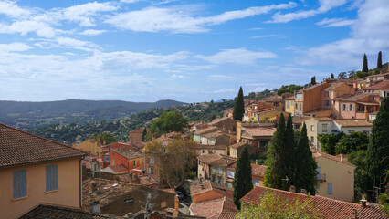 Panoramic view of houses and roofs of medieval village of Bormes-les-Mimosas, in the Var, in Provence, France