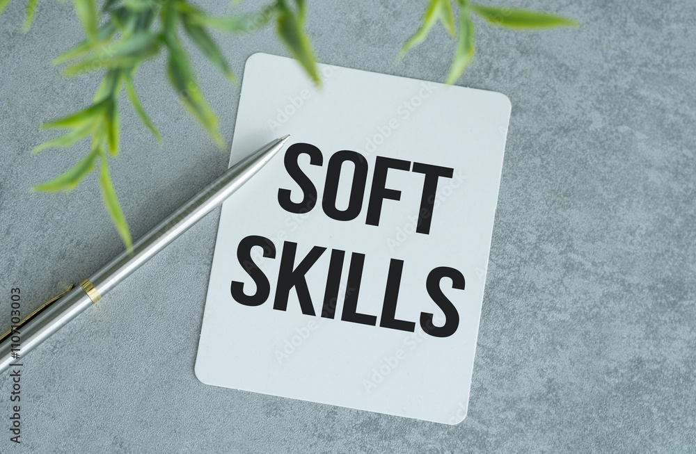Poster soft skills text on paper notepad, gray background