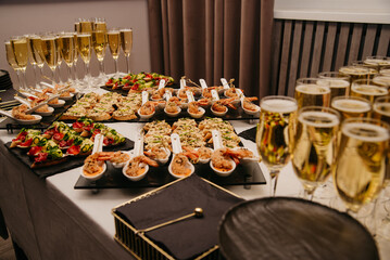 Buffet table with drinks and snacks