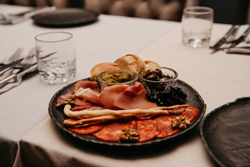 Plate with cold cuts, sausage, prosciutto