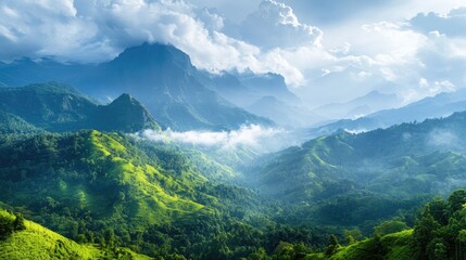 Naklejka premium Breathtaking green mountainscape stretching under cloudy sky