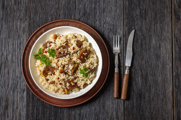 beef and rice in white bowl, top view