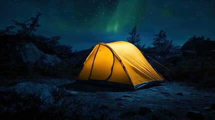A glowing yellow camping tent under a beautiful green northern lights aurora. Travel adventure landscape background. Photo composite.