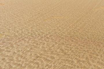Abstract Sand Pattern: Textured Design by the Sea