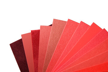 A palette of shades of red paper on a white background. .Textures and shades. Paper samples.