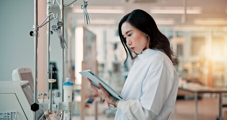 Medical, tablet and science with Japanese woman in laboratory for equipment, research study and...