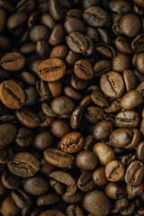 many coffee beans, selected focus, coffee close-up