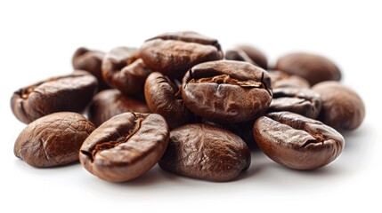 Naklejka premium Coffee beans in a random cluster on a white surface, highlighting their natural shapes