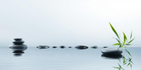 Tranquil spa background featuring bamboo and stones on calm water, calm, wellness