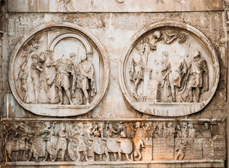 Rome, Italy. Details Of Arch Of Constantine. Bas-relief On Facade Of Triumphal Arch