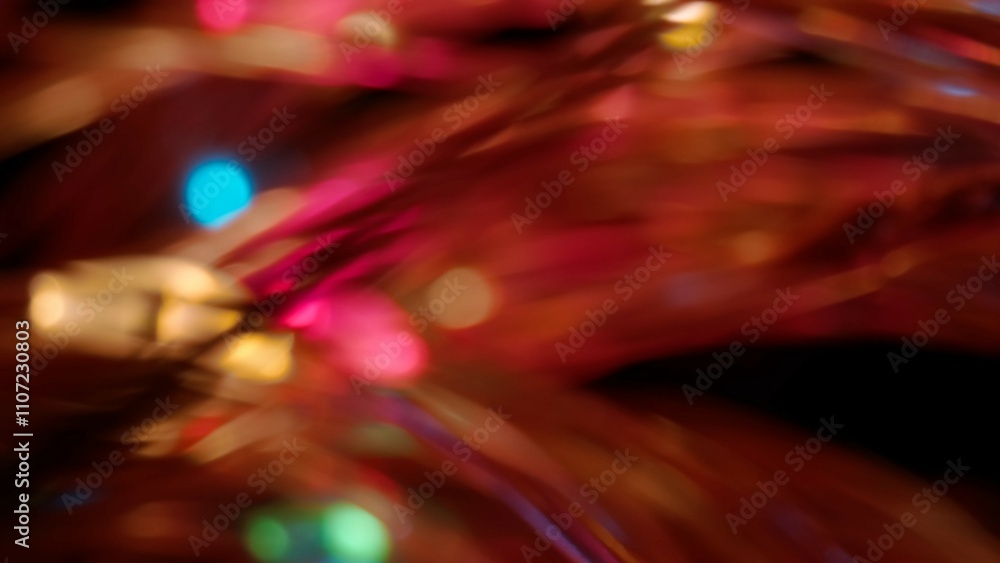Poster blurred colorful lens flare motion studio lightning, wire garland with bokeh effect on dark backgrou
