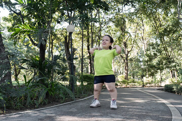 Energetic Exercise Routine: Small Body Stretching Muscles in a Serene Outdoor Park Setting