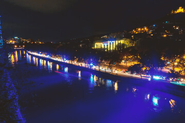 Night embankment in Tbilisi. Kura River