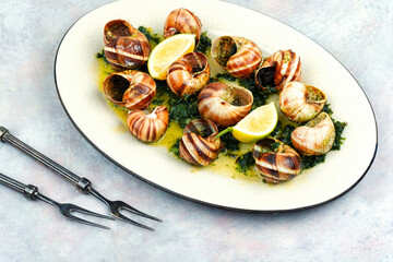 Baked snails with butter.