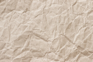 Crumpled craft beige paper background