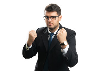 Angry entrepreneur in formalwear showing fists boxing concept