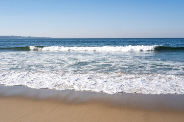 Surf coming into a beach in Monterey Bay, California, USA