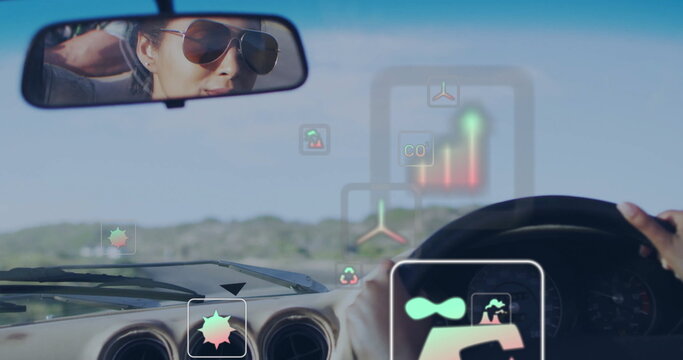 Image of eco icons over biracial woman driving car