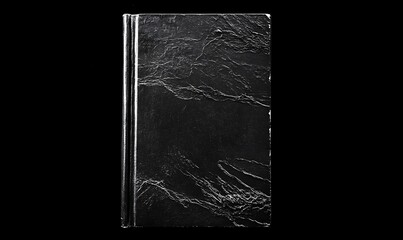 Black Book With Textured Cover Isolated On Black Background