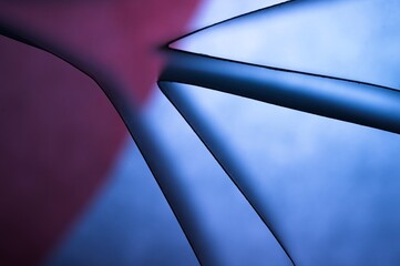 Abstract background of black lines on pink and blue with shadows