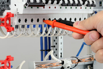 Measurement of electrical parameters using a multimeter.