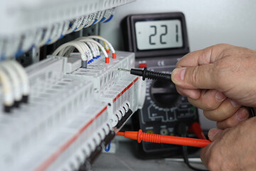 Measurement of electrical parameters using a multimeter.
