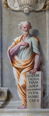 ASTI, ITALY - SEPTEMBER 11, 2024: The fresco of prophet Daniel in the Cathedral by Francesco...