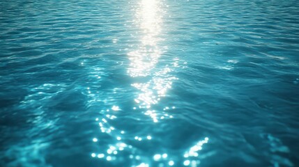 Obraz premium Sunlight reflecting on the surface of blue water.