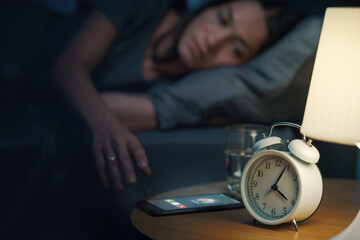 Woman receiving a phone call at night