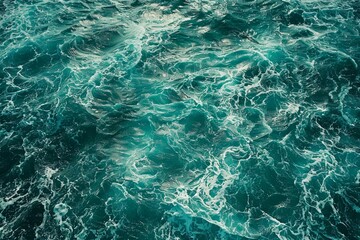 Fototapeta premium Photo of Waves of water of the river and the sea. Background texture for backdrops or mapping