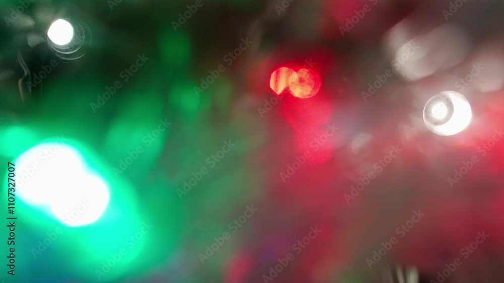 Poster blurred colorful lens flare motion studio lightning, garland with bokeh effect on dark background. l