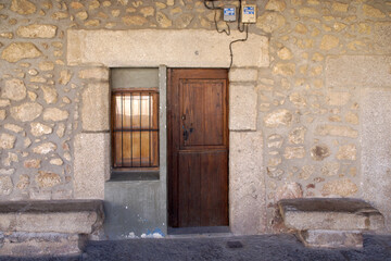 Cuacos de Yuste (Cáceres) Spain. Entrance to a house in the arcade of the main square of the town...